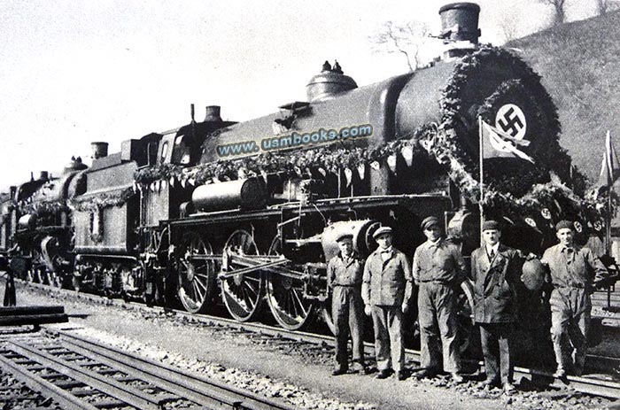 German locomotive decorated with swastika flags