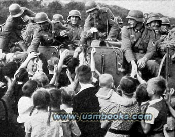 Wehrmacht soldiers with ethnic germans in Poland